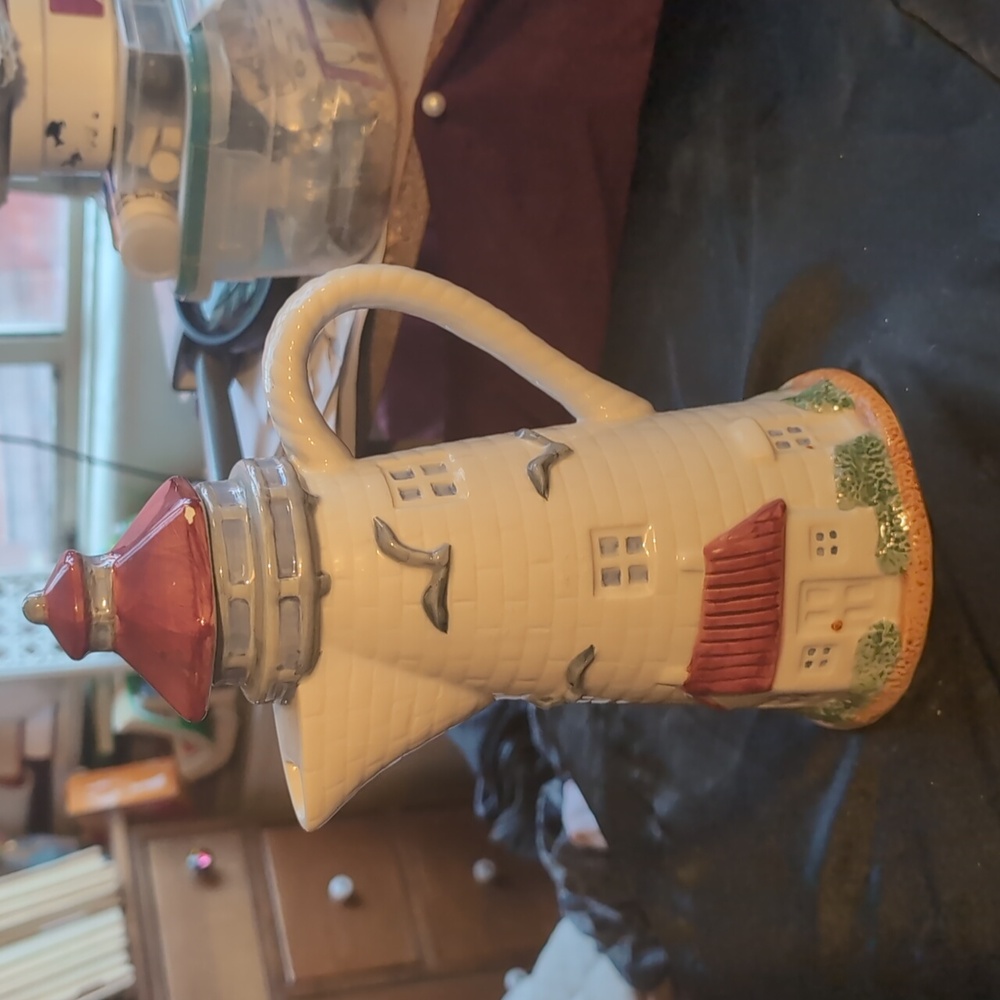 AVAILABLE - Flowers Inc, Balloons. Light house tea pot. For the Nautical lover.